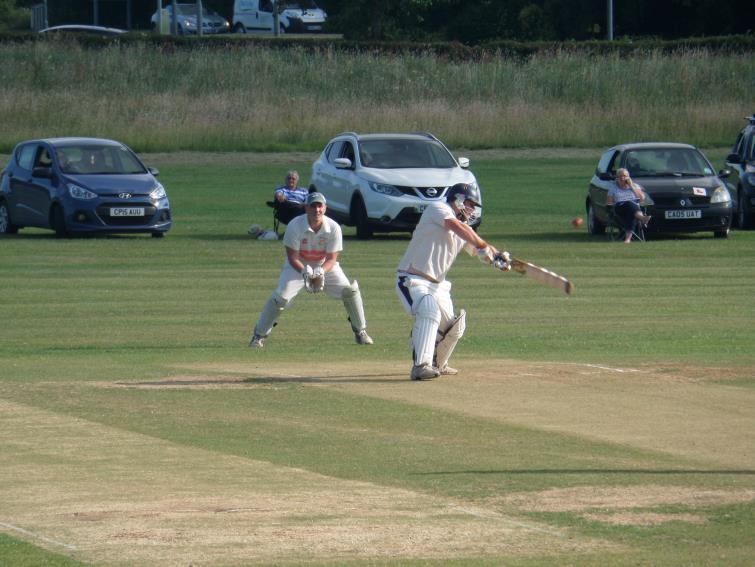 Phil Llewellyn plays a nice shot through the covers for Llangwm